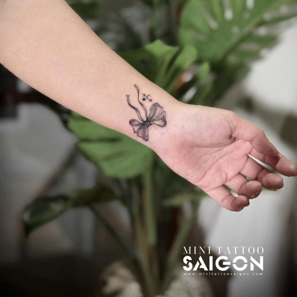 Hình xăm che sẹo ở tay cho nữ