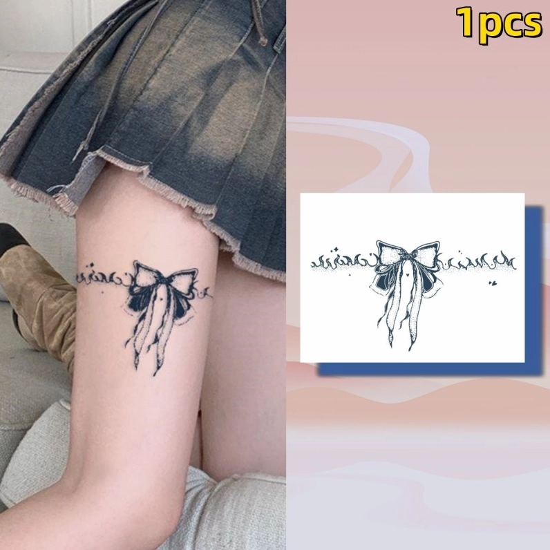 Hình xăm nhỏ xinh trên đùi trong